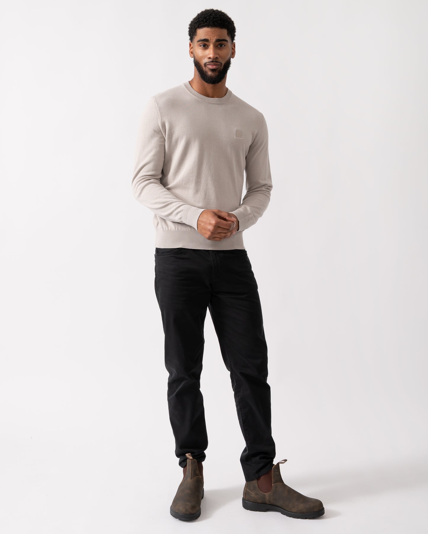 full legnth shot of a model wearing a BOSS Orange Kanovano Mens Crew Neck Jumper in Open Grey