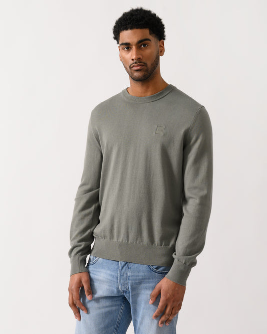 model wearing a BOSS Orange Kanovano Mens Crew Neck Jumper in Open Grey 076