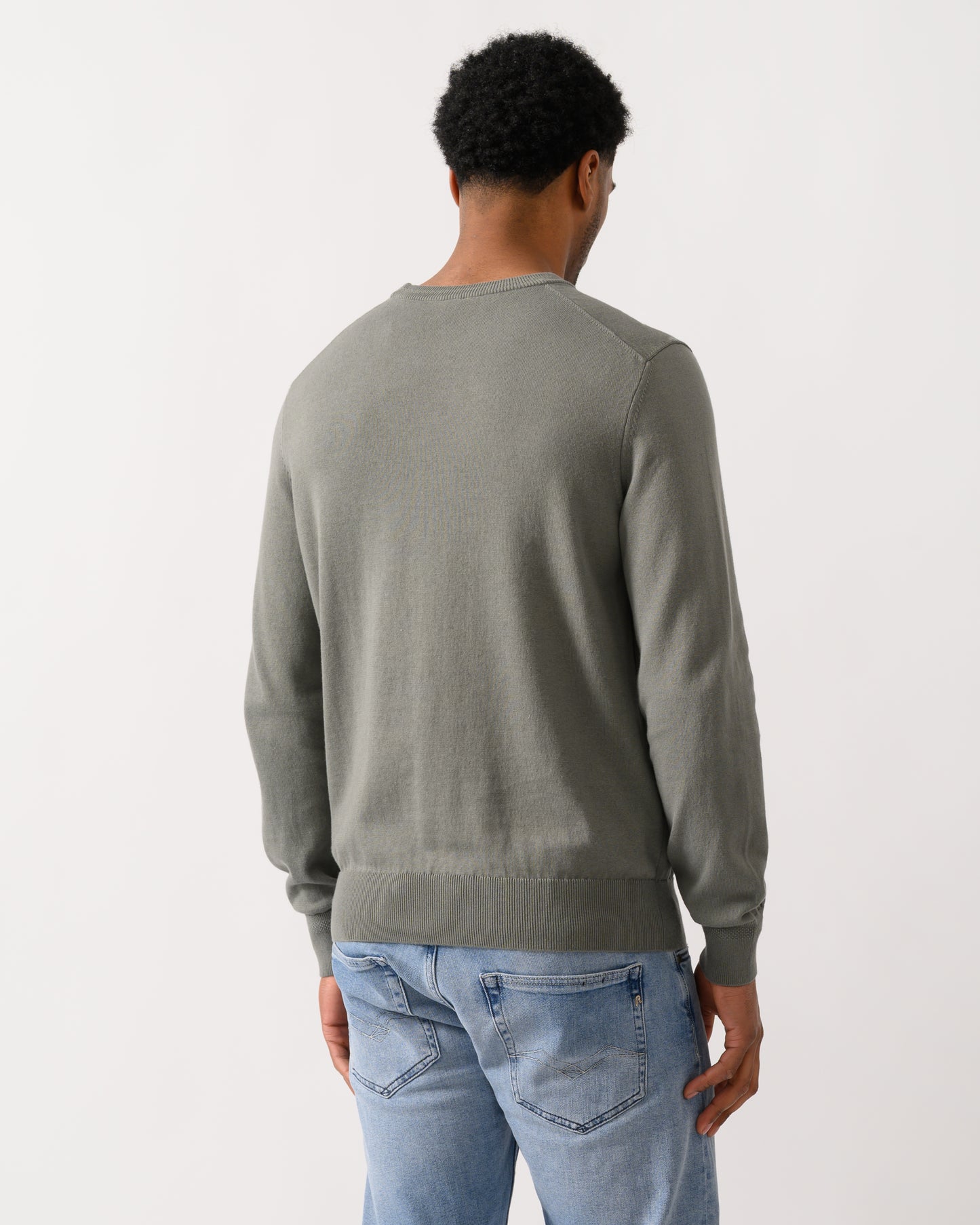 back shot of a model wearing a BOSS Orange Kanovano Mens Crew Neck Jumper in Open Grey 076