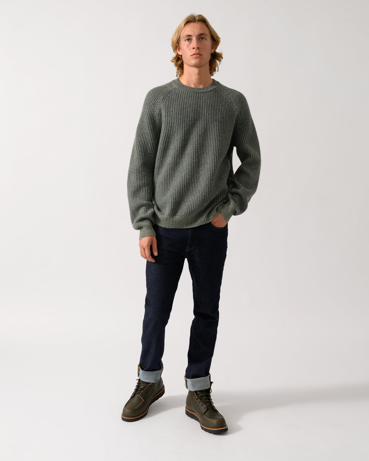 full length of a model wearing a BOSS Orange Kepler Mens Crew Neck Jumper in Open Green 370