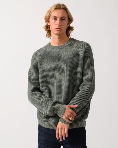 model wearing a BOSS Orange Kepler Mens Crew Neck Jumper in Open Green 370
