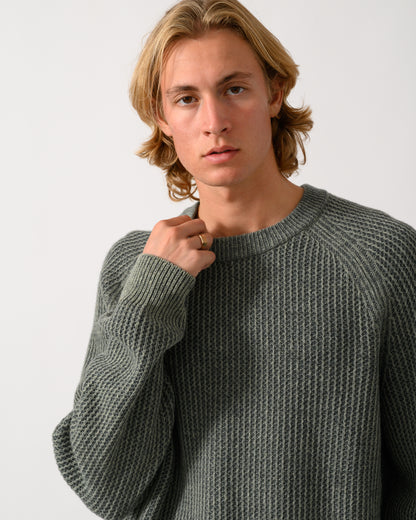 close up of a model wearing a BOSS Orange Kepler Mens Crew Neck Jumper in Open Green 370