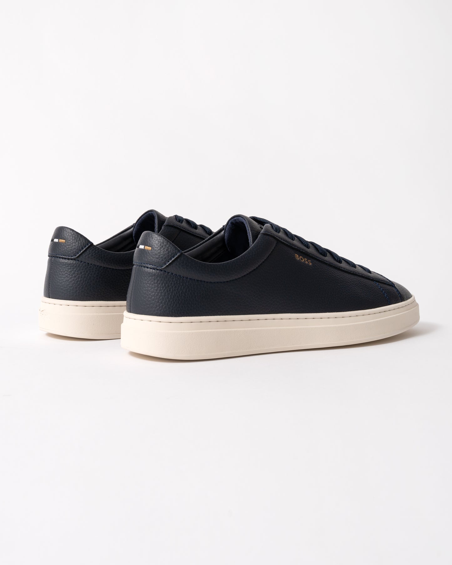 back view of BOSS Orange Kieran Mens Grained-leather trainers with rubber sole in Dark Blue 407