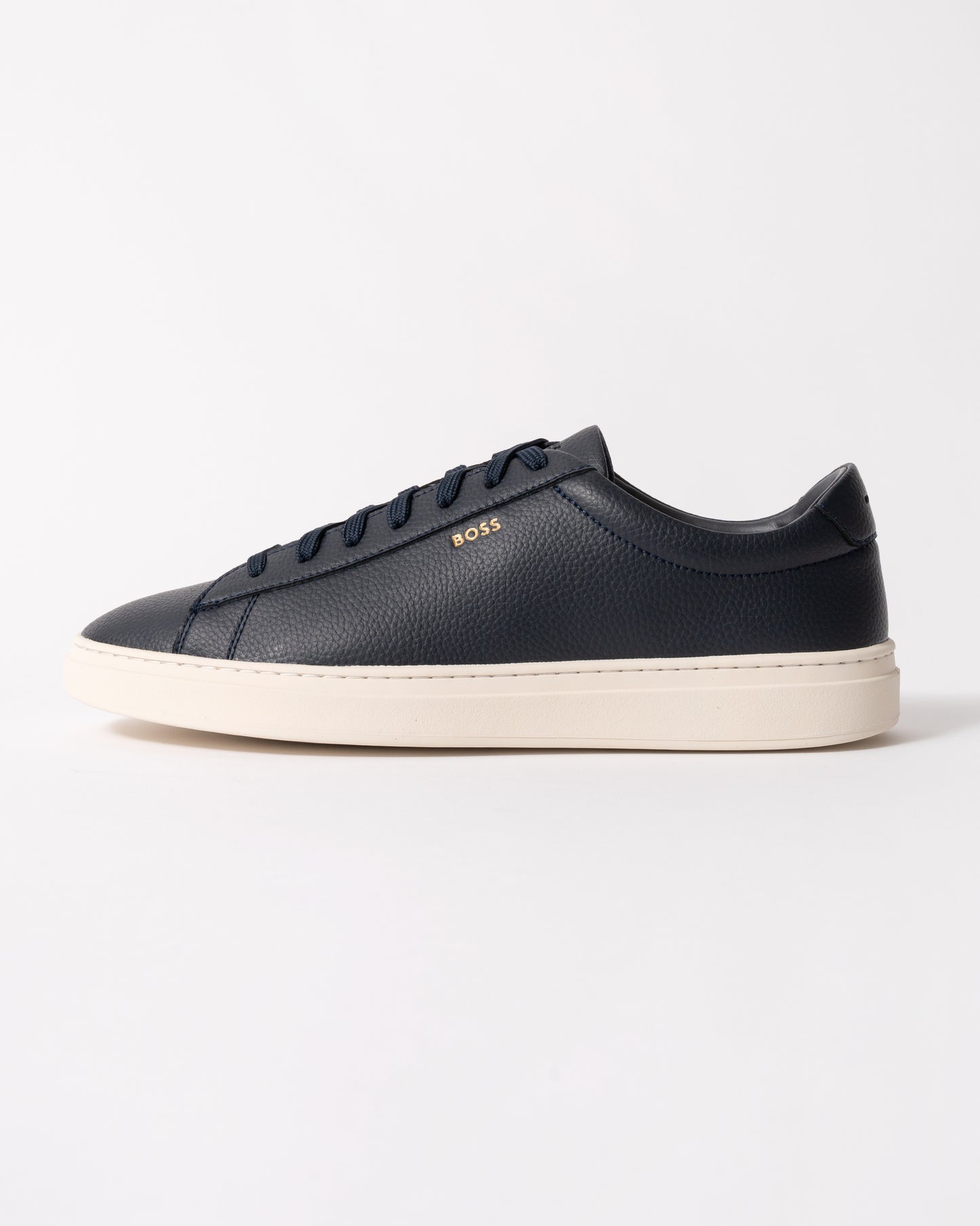 side view of BOSS Orange Kieran Mens Grained-leather trainers with rubber sole in Dark Blue 407