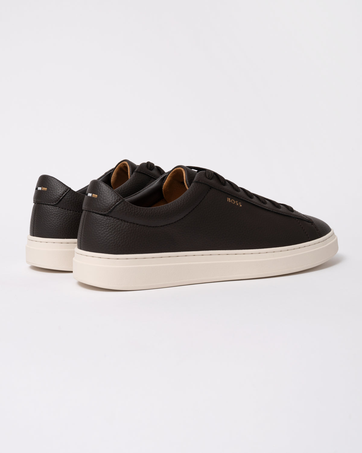 Studio photograph showing back of BOSS Orange Kieran Mens Grained-leather trainers with rubber sole in Dark Brown 203