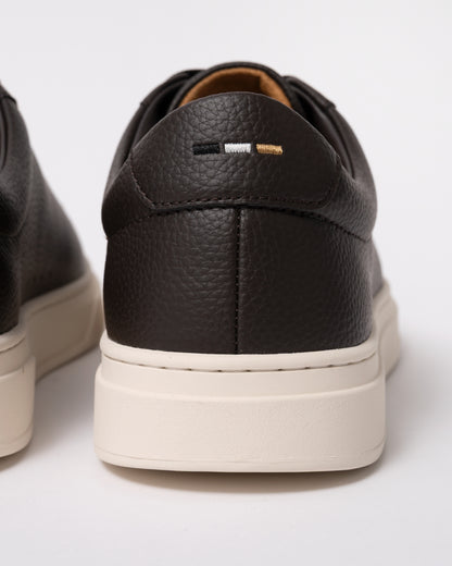 Studio photograph showing back of BOSS Orange Kieran Mens Grained-leather trainers with rubber sole in Dark Brown 203