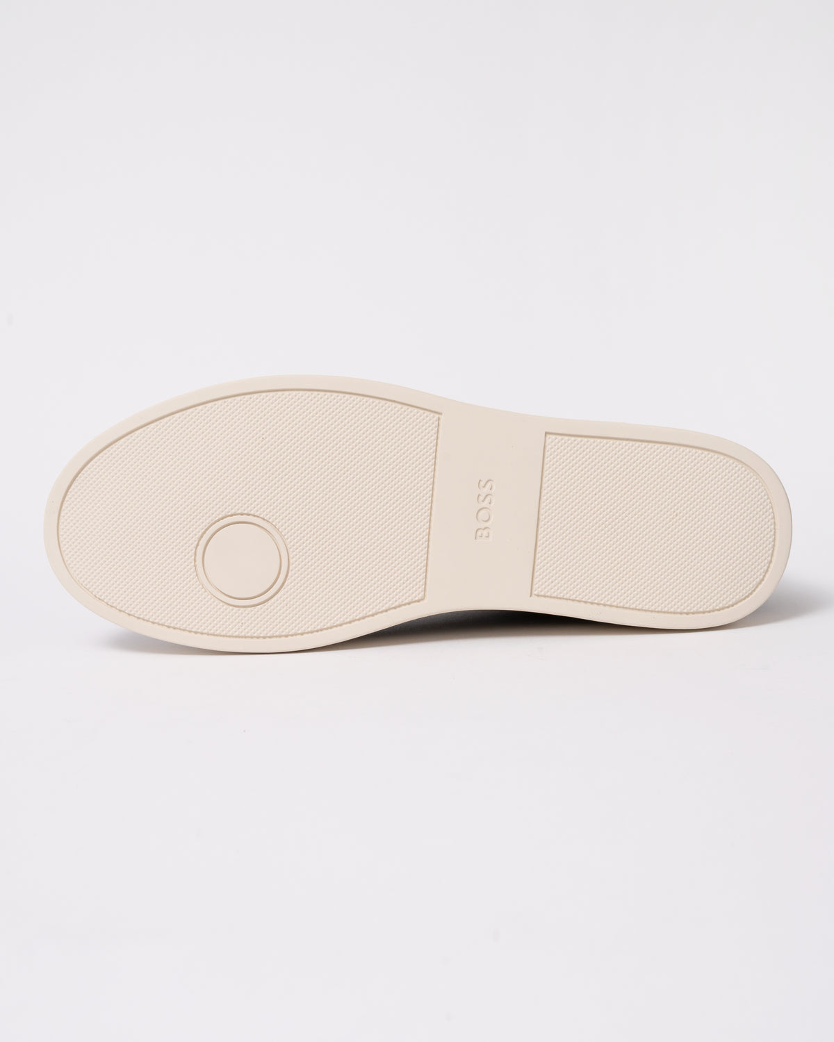 Studio photograph showing sole of BOSS Orange Kieran Mens Grained-leather trainers with rubber sole in Dark Brown 203