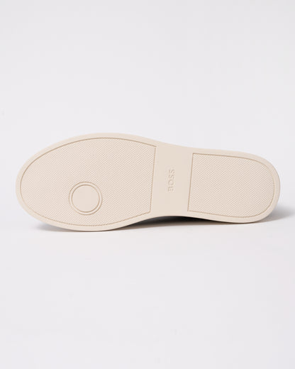 Studio photograph showing sole of BOSS Orange Kieran Mens Grained-leather trainers with rubber sole in Dark Brown 203