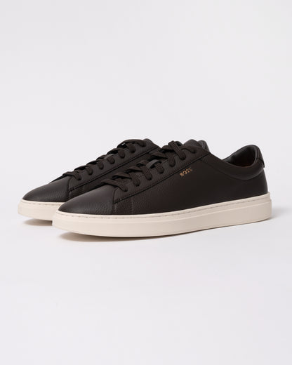 Studio photograph showing BOSS Orange Kieran Mens Grained-leather trainers with rubber sole in Dark Brown 203