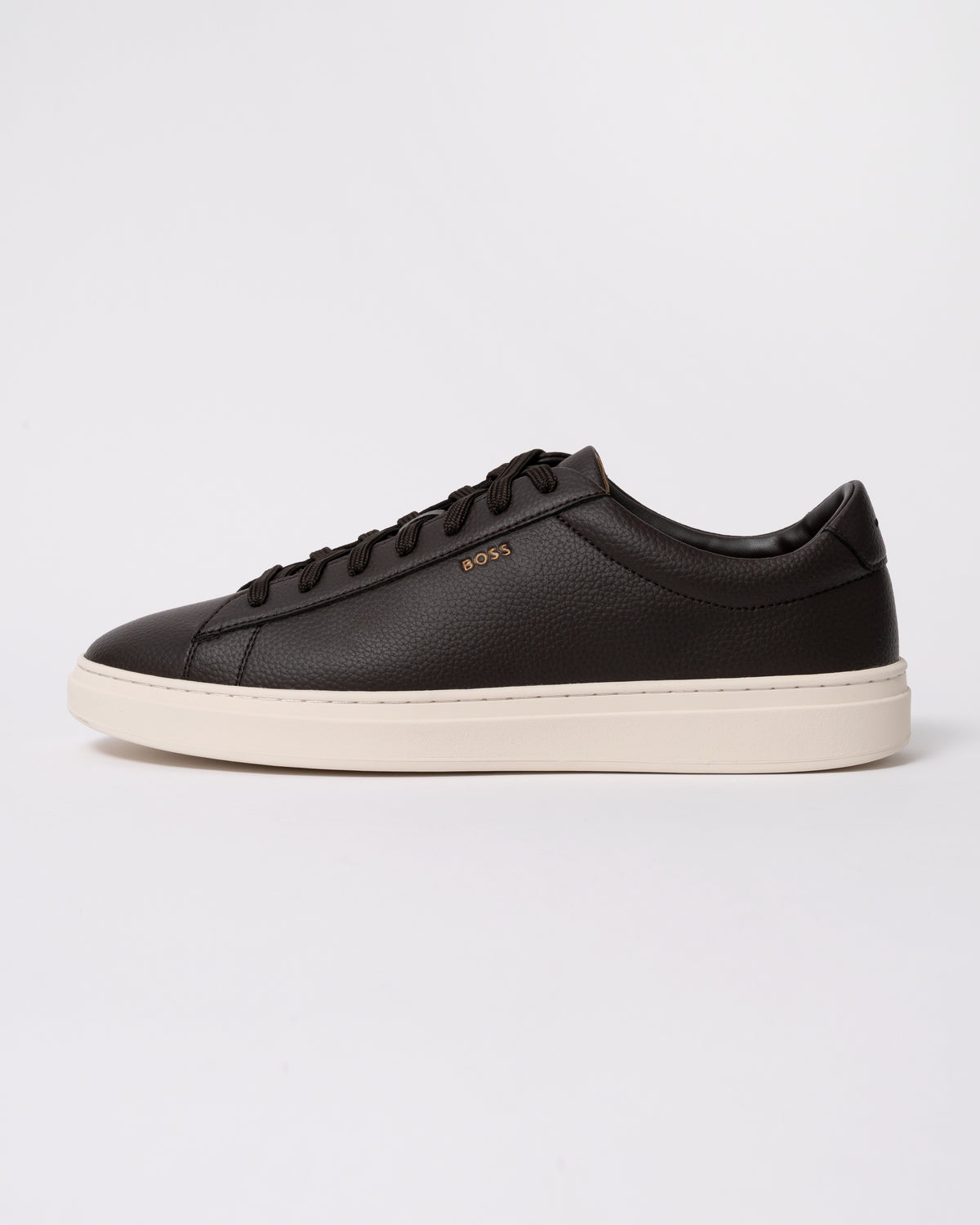 Studio photograph showing side of BOSS Orange Kieran Mens Grained-leather trainers with rubber sole in Dark Brown 203