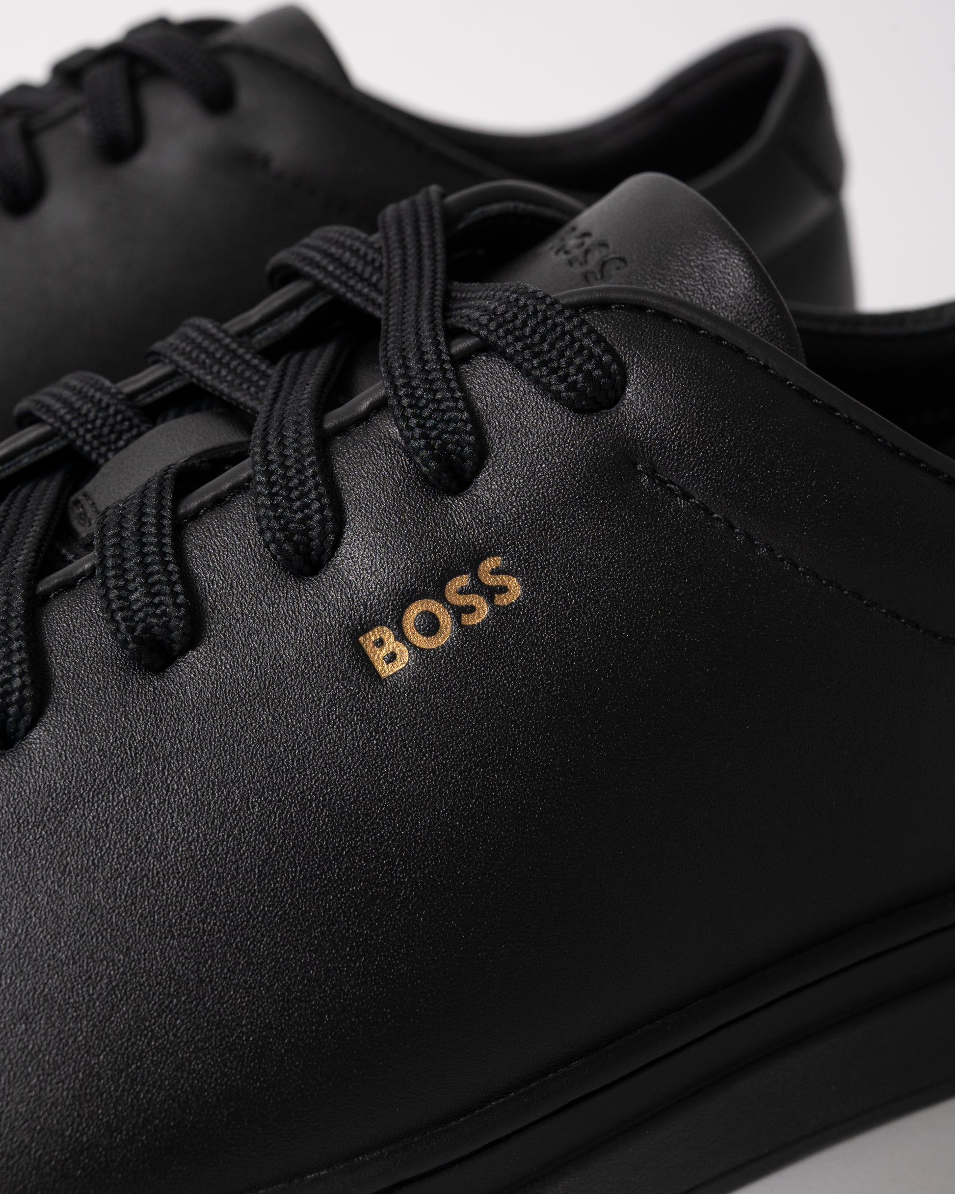 close up view of BOSS Orange Kieran_Tenn_butb Mens Trainers in Black 005