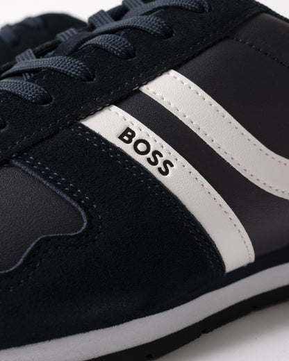 close up studio shot of BOSS Orange Levon Runn pumi Mens Trainers in Dark Blue 401