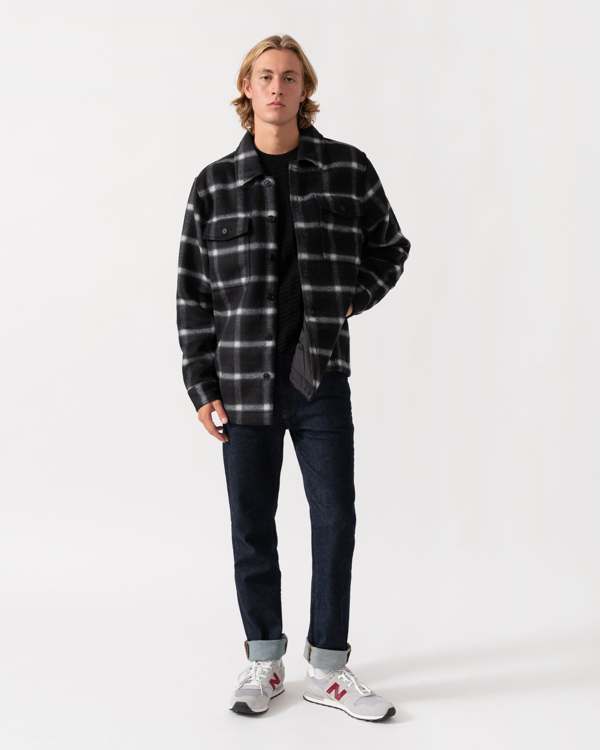 Man wearing the BOSS Orange Losky Mens Long Sleeve Check Shirt - Black 001