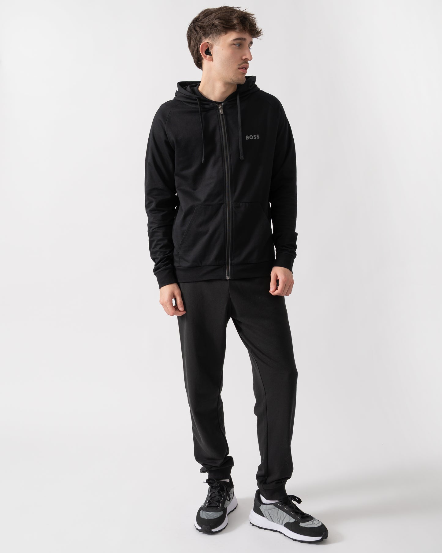 full length shot of a model wearing a BOSS Orange Mens Authentic Zip Up Loungewear Hoodie in Black 004
