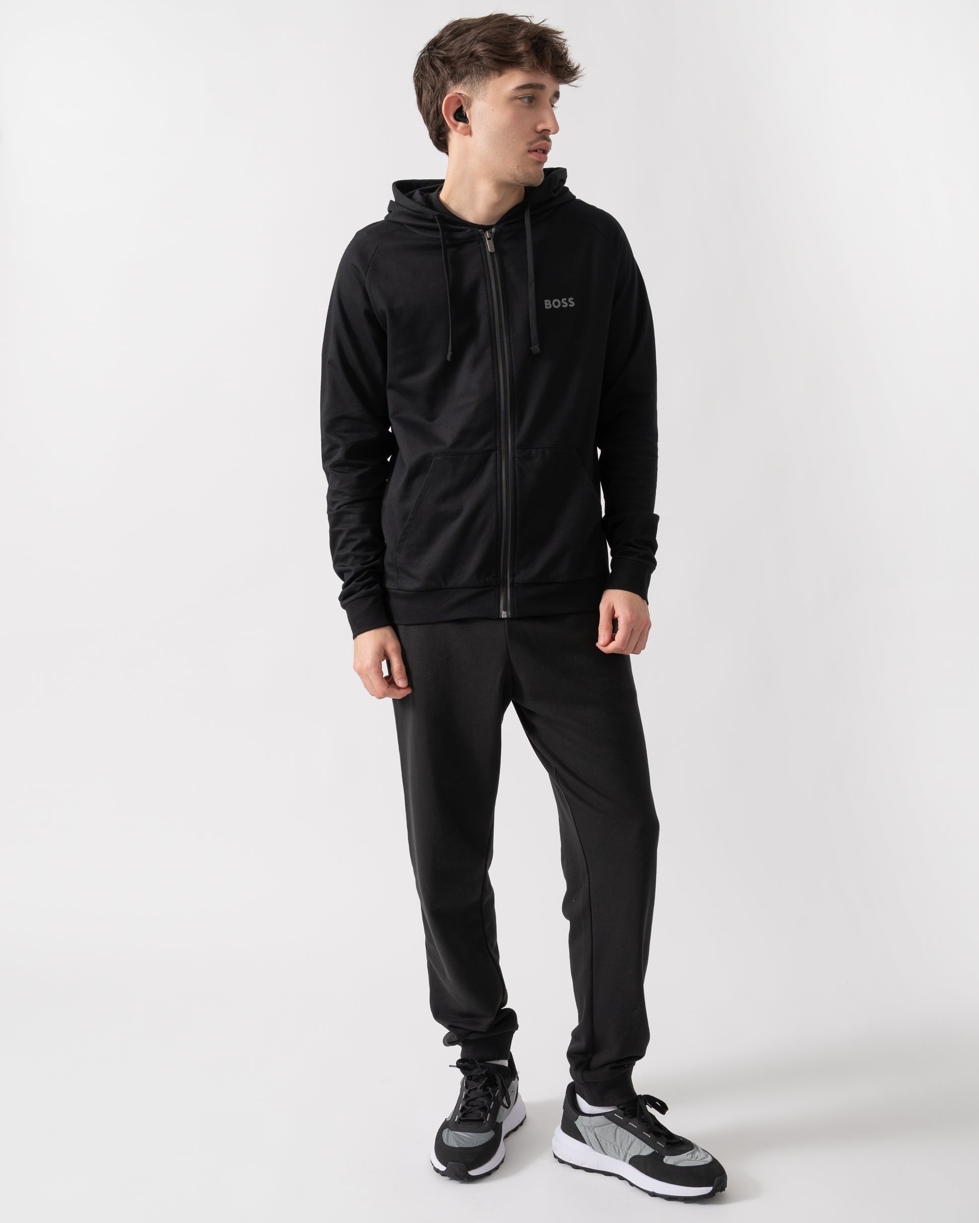 full length shot of a model wearing a BOSS Orange Mens Authentic Zip Up Loungewear Hoodie in Black 004