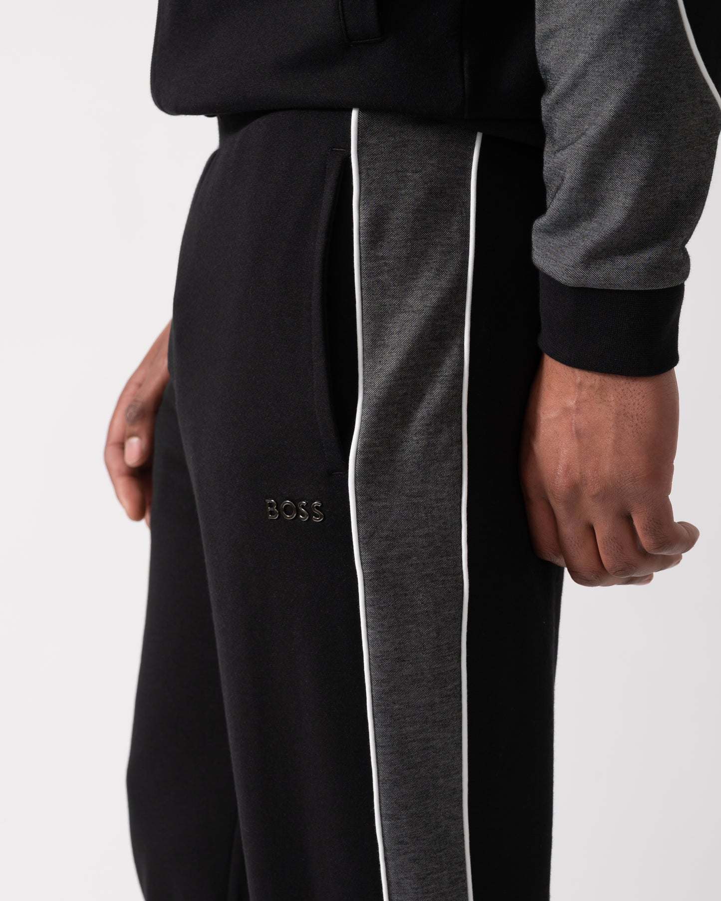 close up shot of a Model wearing a BOSS Orange Mens Loungewear Tracksuit Pants in Black