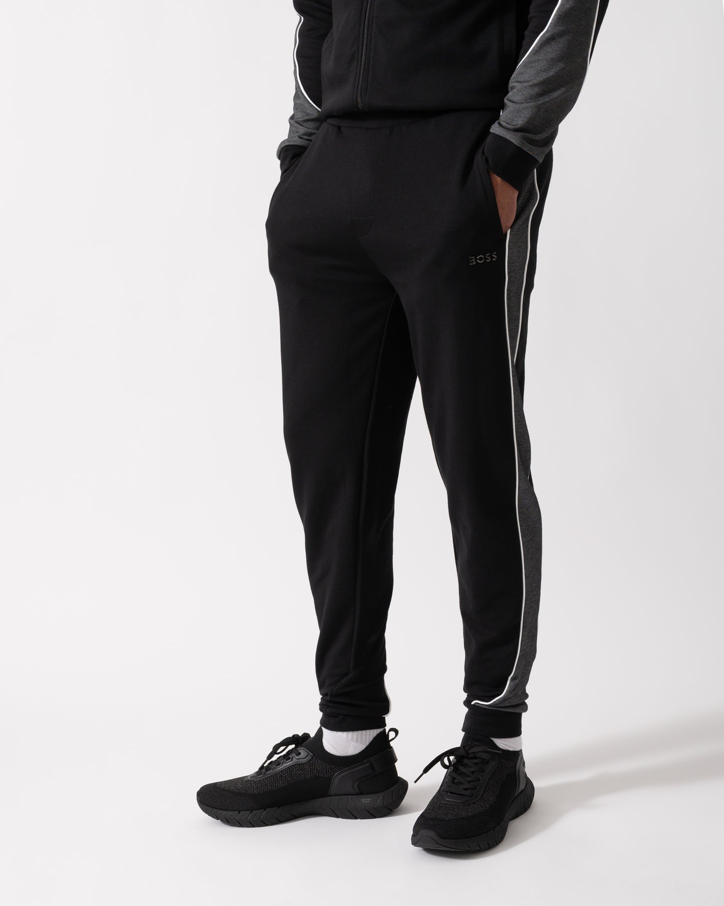Model wearing a BOSS Orange Mens Loungewear Tracksuit Pants in Black