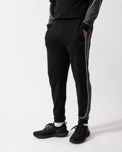 Model wearing a BOSS Orange Mens Loungewear Tracksuit Pants in Black