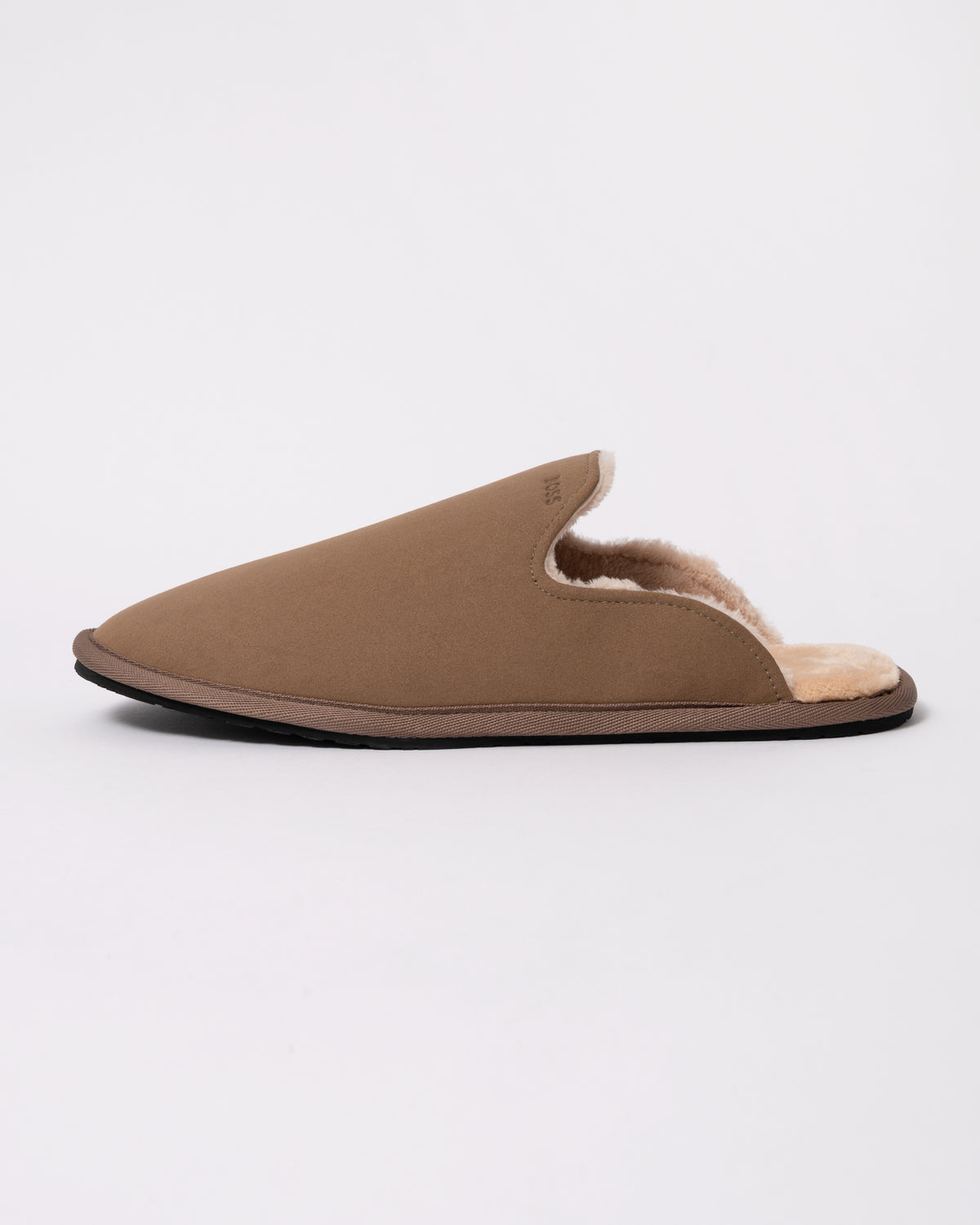 Studio photograph showing BOSS Orange Mens Shearling-lined slip-on slippers with logo detail in Medium Beige 260