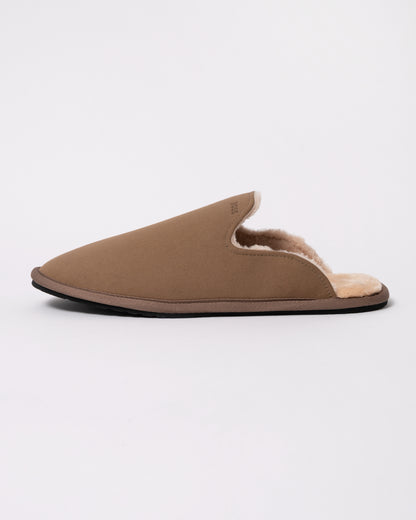 Studio photograph showing BOSS Orange Mens Shearling-lined slip-on slippers with logo detail in Medium Beige 260