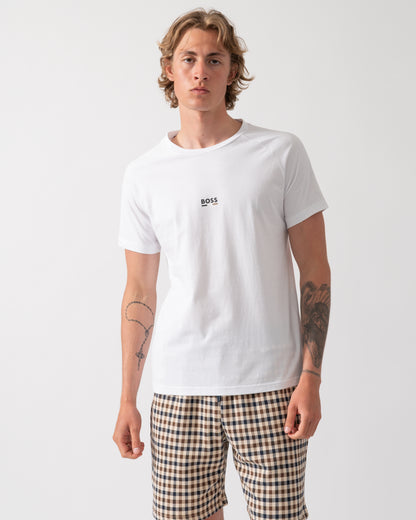 model wearing a BOSS Orange Mens Slim Fit Beach T-Shirt in Natural 105