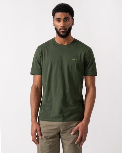 model wearing a HUGO Dero222 Mens Cotton-Jersey T-Shirt with Logo Print in Dark Green