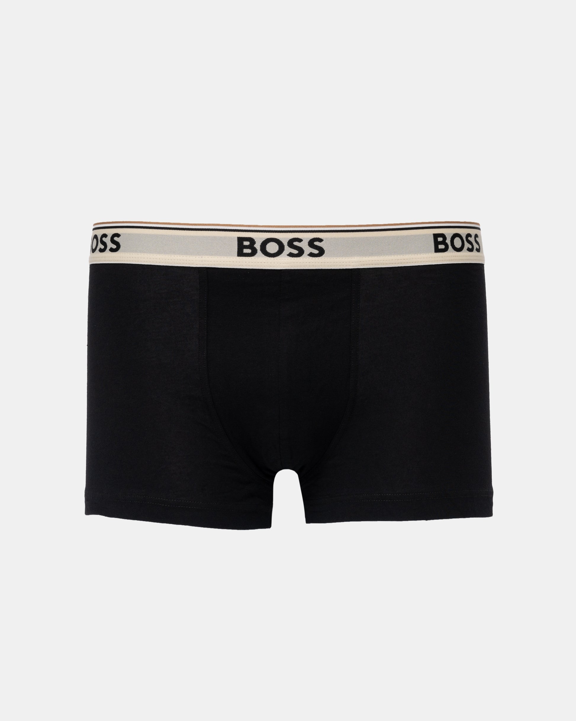Black BOSS men's boxer briefs with a beige elastic waistband featuring black BOSS branding.