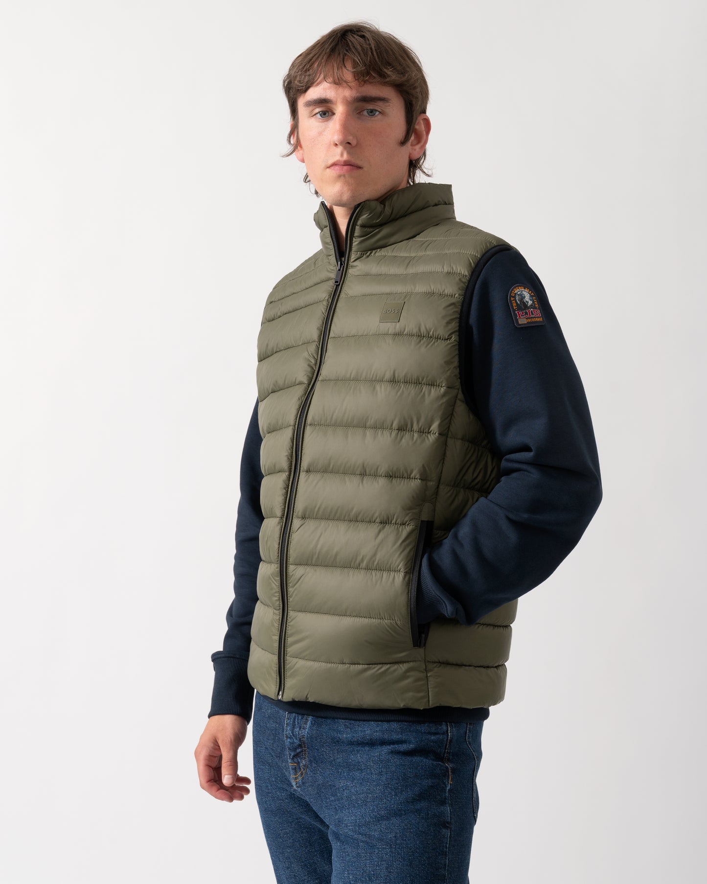 model wearing a BOSS Orange Odeno 2 Mens Gilet in Bright Green 325