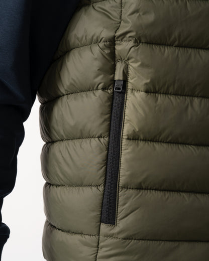 pocket detail shot of a model wearing a BOSS Orange Odeno 2 Mens Gilet in Bright Green 325