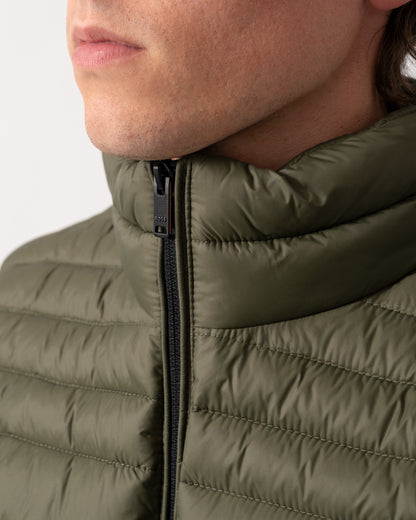 zip detail shot of a model wearing a BOSS Orange Odeno 2 Mens Gilet in Bright Green 325