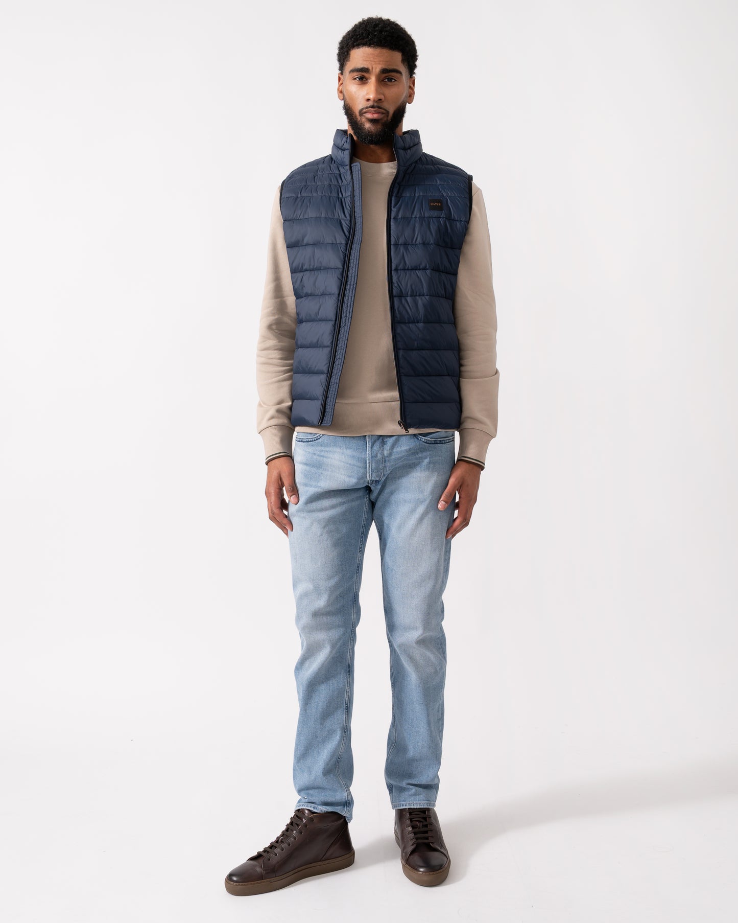 Full length shot of a Model wearing a BOSS Orange Odeno 2 Mens Gilet in Dark Blue