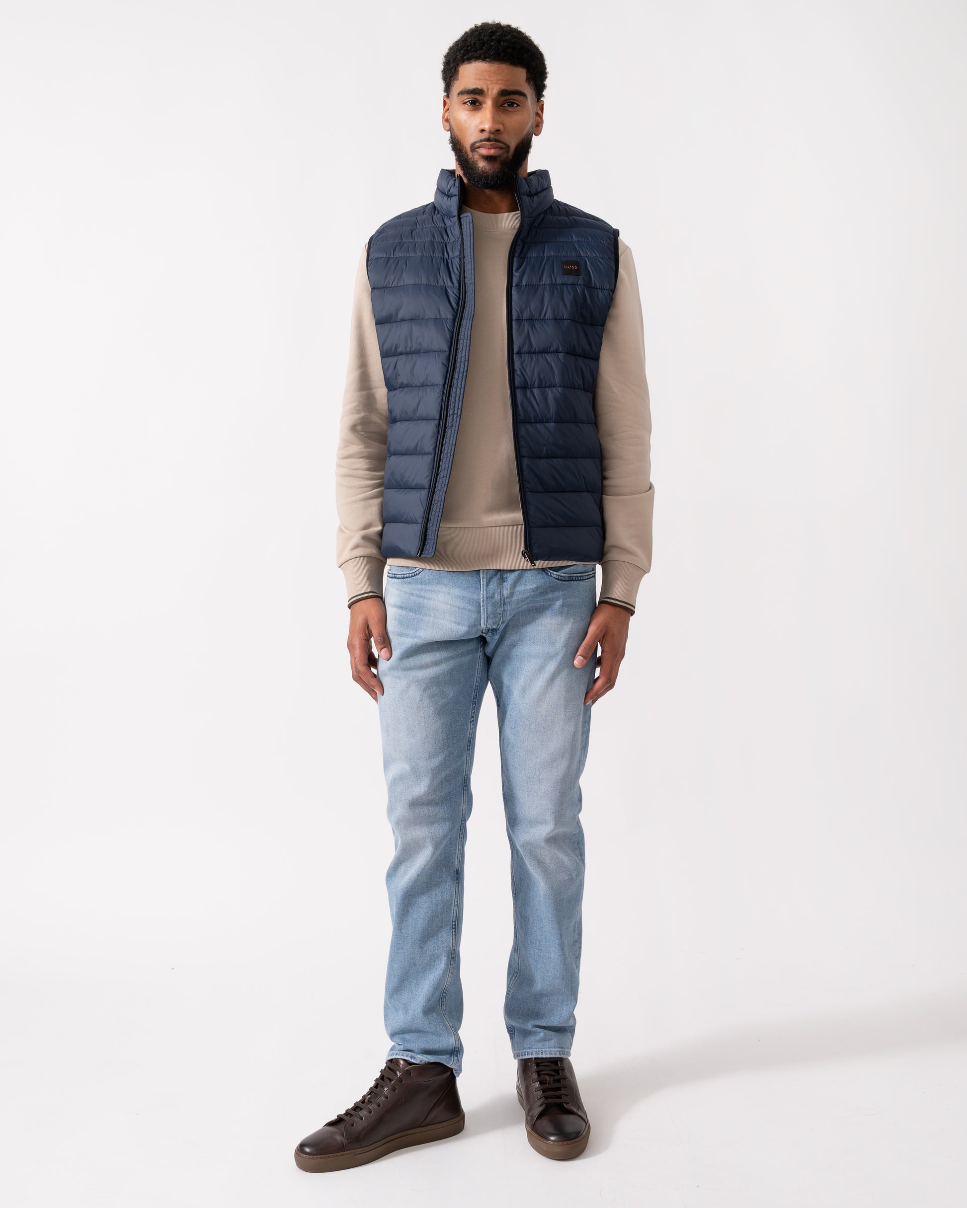 Full length shot of a Model wearing a BOSS Orange Odeno 2 Mens Gilet in Dark Blue