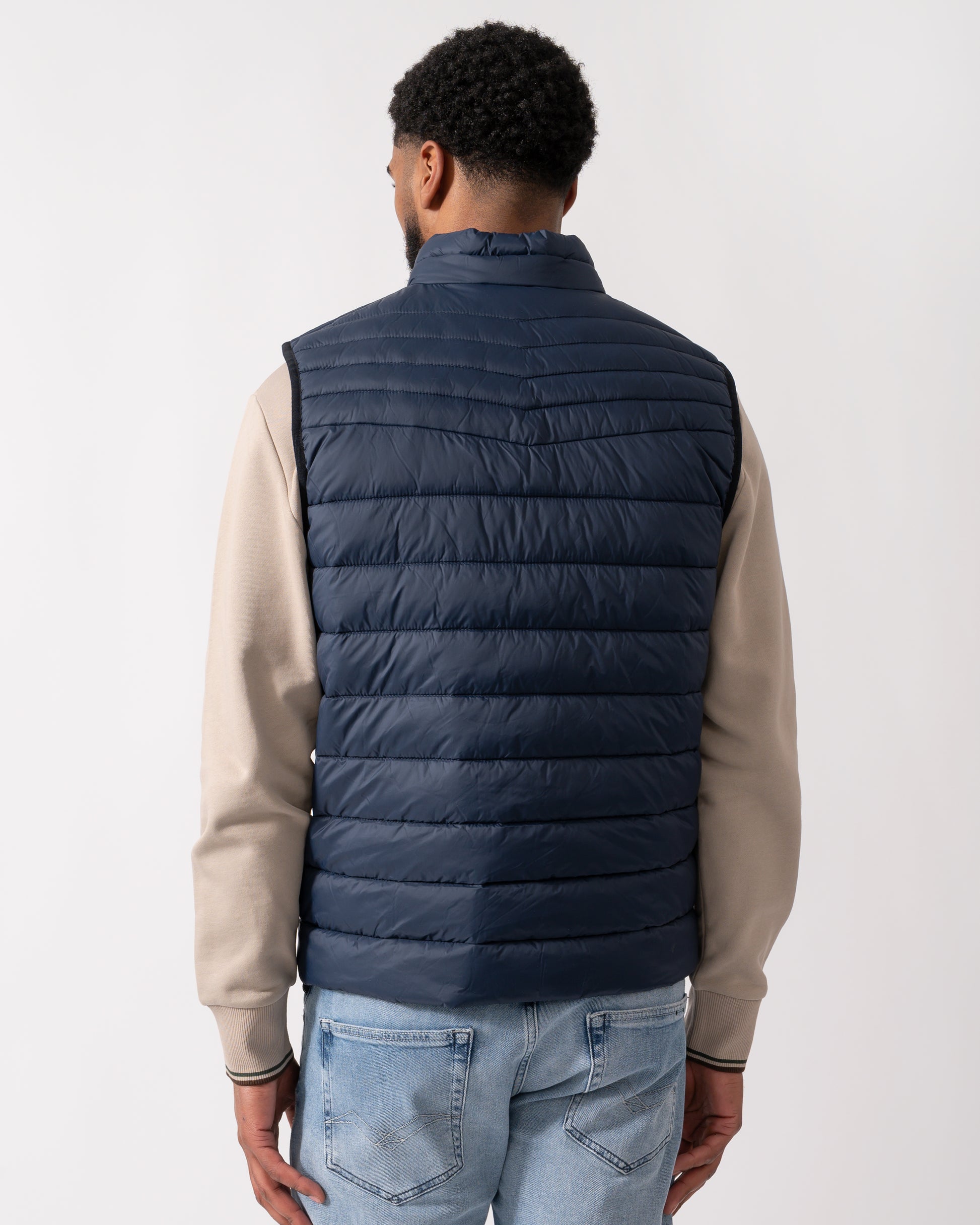 back shot of a Model wearing a BOSS Orange Odeno 2 Mens Gilet in Dark Blue
