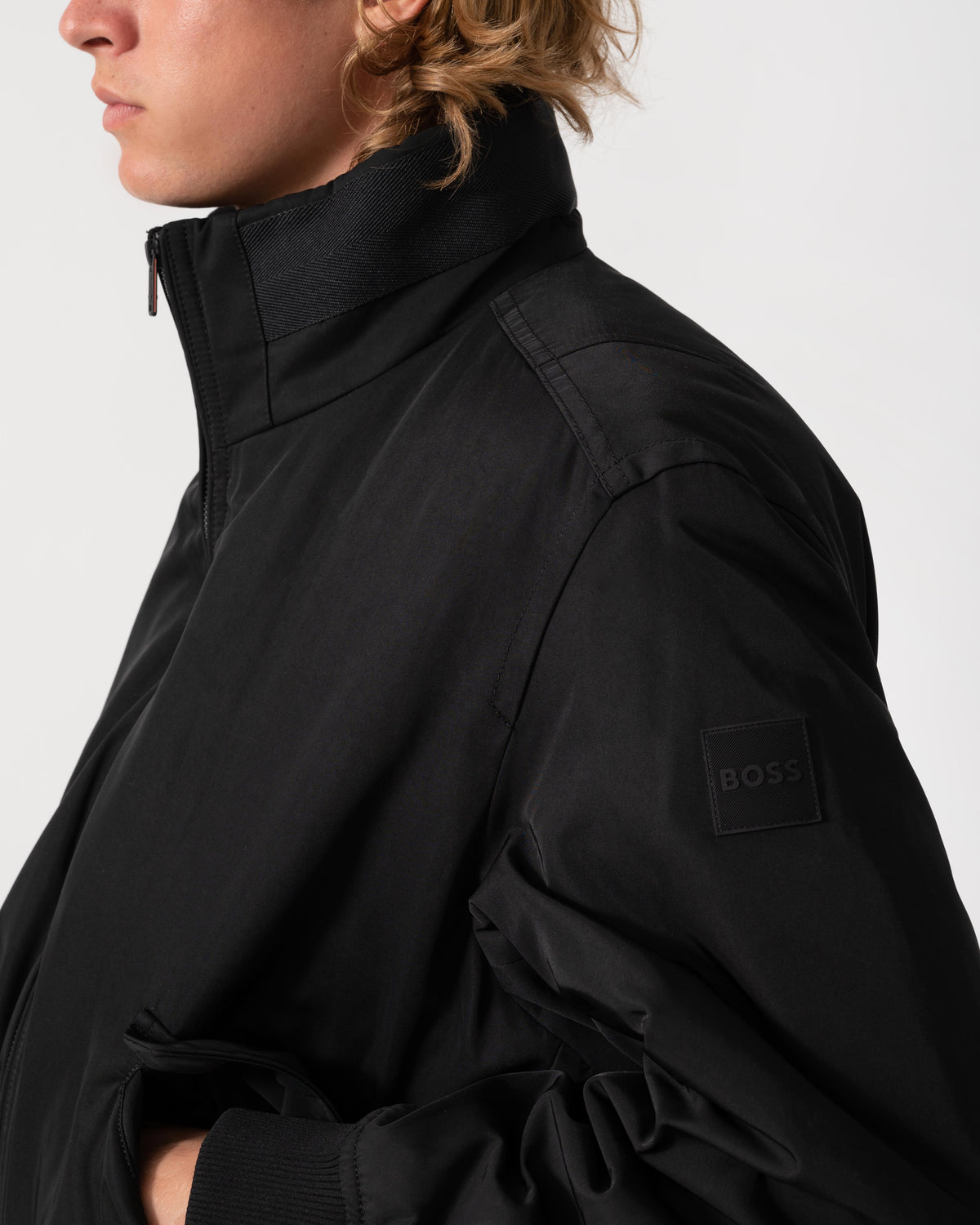 Logo on the BOSS Orange Ojens 3-in-1 Bomber Jacket - Black 001