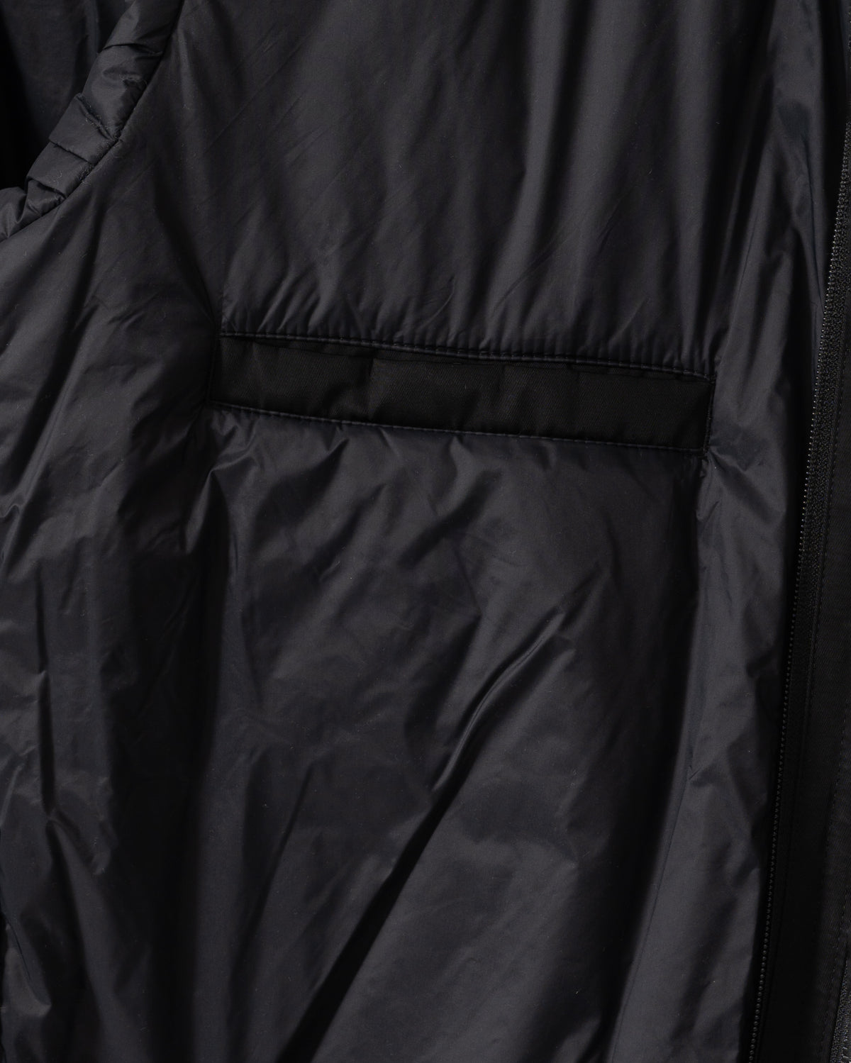 Inside on the gilet of the BOSS Orange Ojens 3-in-1 Bomber Jacket - Black 001