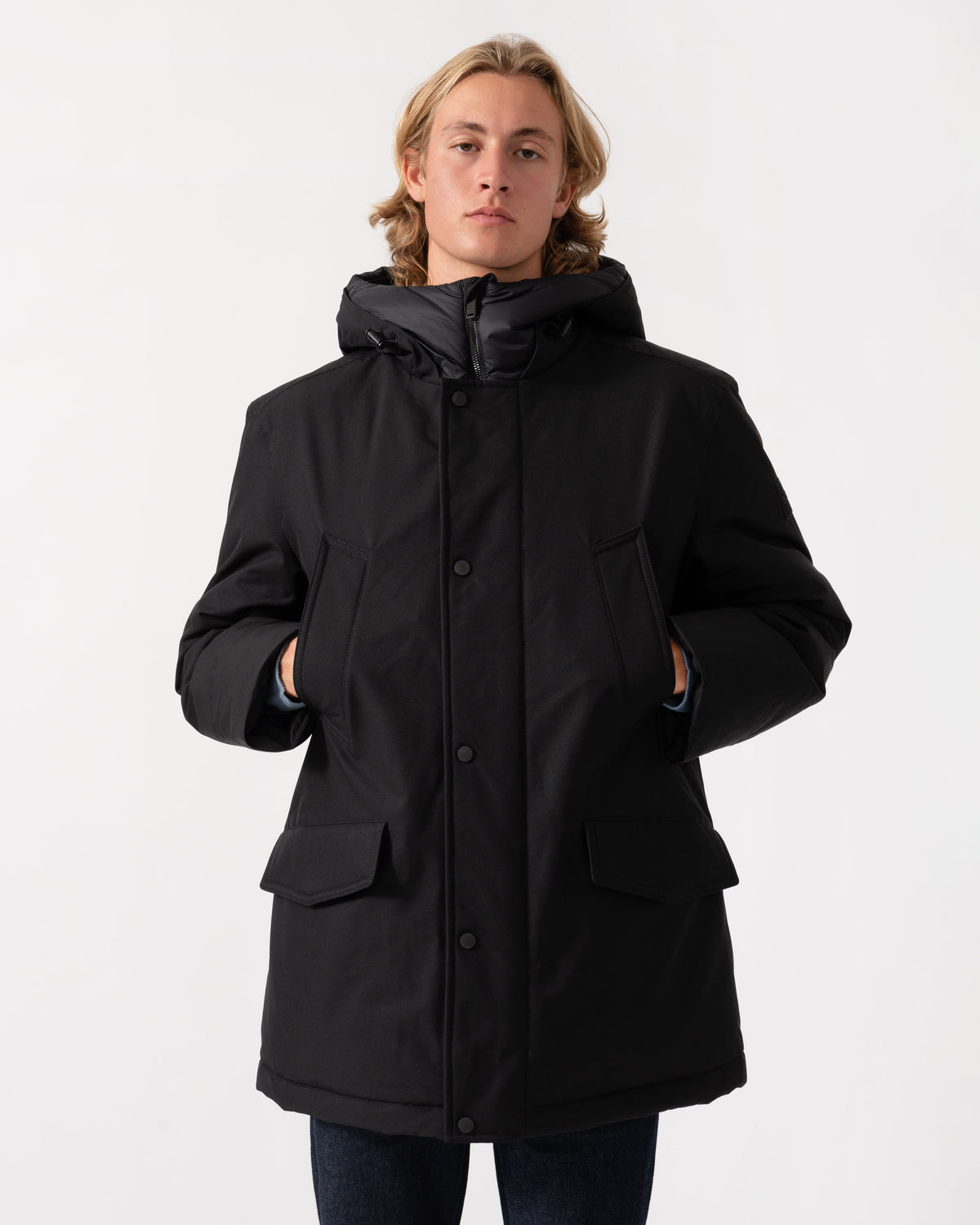 The BOSS Orange Osiass1 Mens Parka - Black 001 zipped zip on a model