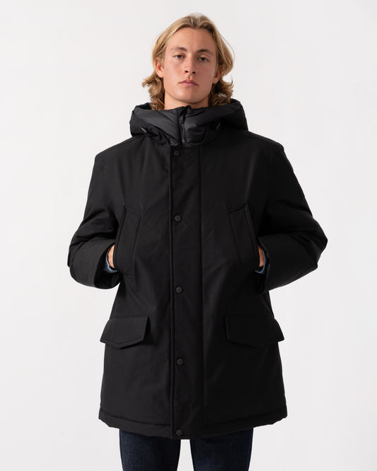 The BOSS Orange Osiass1 Mens Parka - Black 001 zipped zip on a model