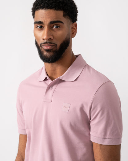 close up of a model wearing a BOSS Orange Passenger Mens Stretch-Cotton Slim-Fit Polo Shirt with Logo Patch in Light/Pastel Purple
