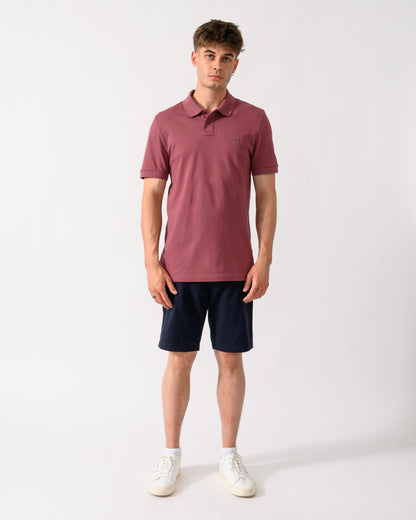 full length shot of a model wearing a BOSS Orange Passenger Mens Stretch-Cotton Slim-Fit Polo Shirt with Logo Patch in Medium Red 618