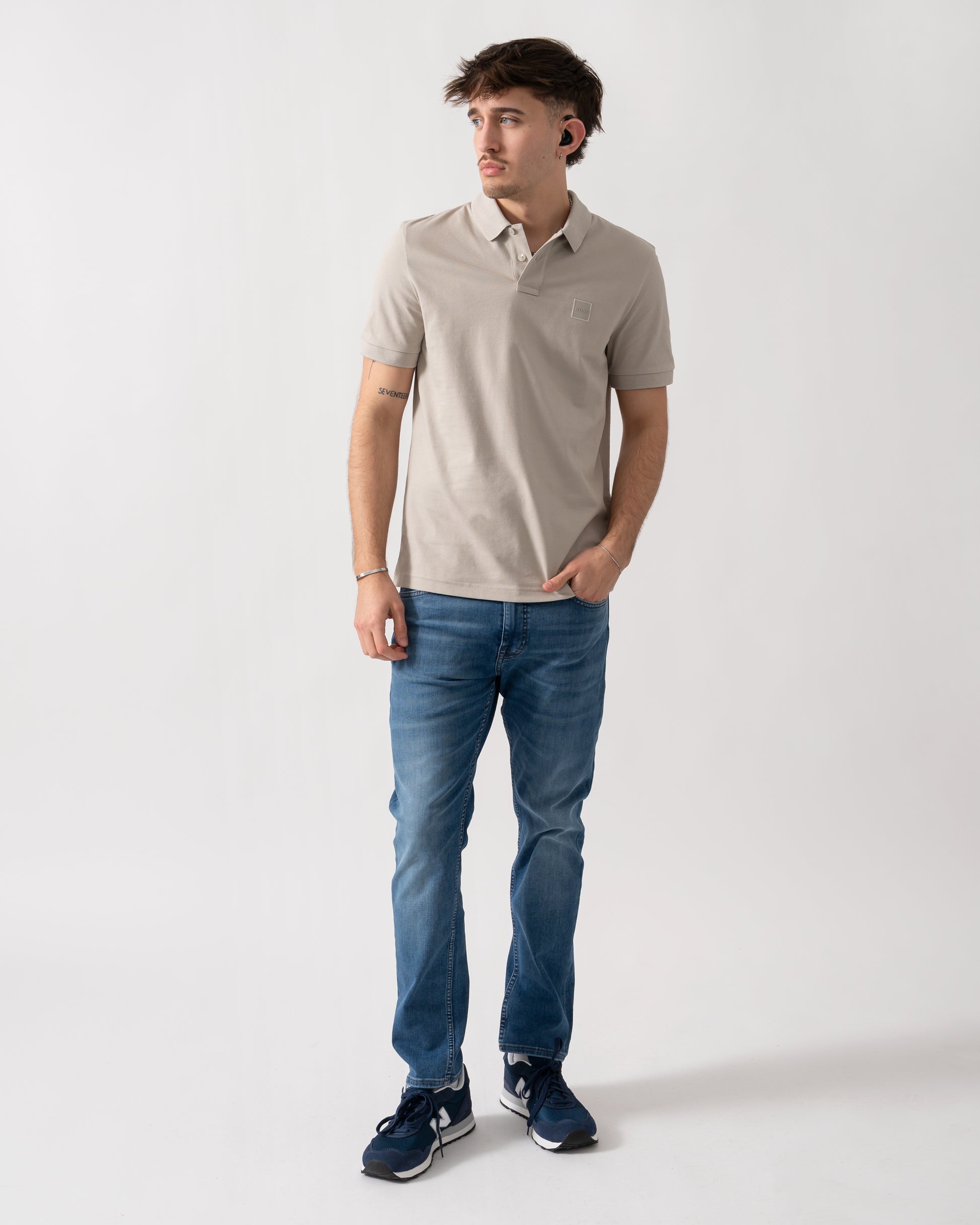 full length shot of a model wearing a BOSS Orange Passenger Mens Stretch-Cotton Slim-Fit Polo Shirt with Logo Patch in Open Grey 070