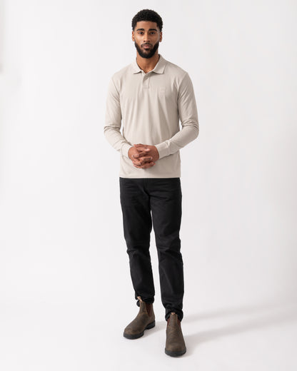 full length shot of a model wearing a BOSS Orange Passerby Mens Long Sleeve Stretch-Cotton Polo Shirt with Logo Patch in Open Grey