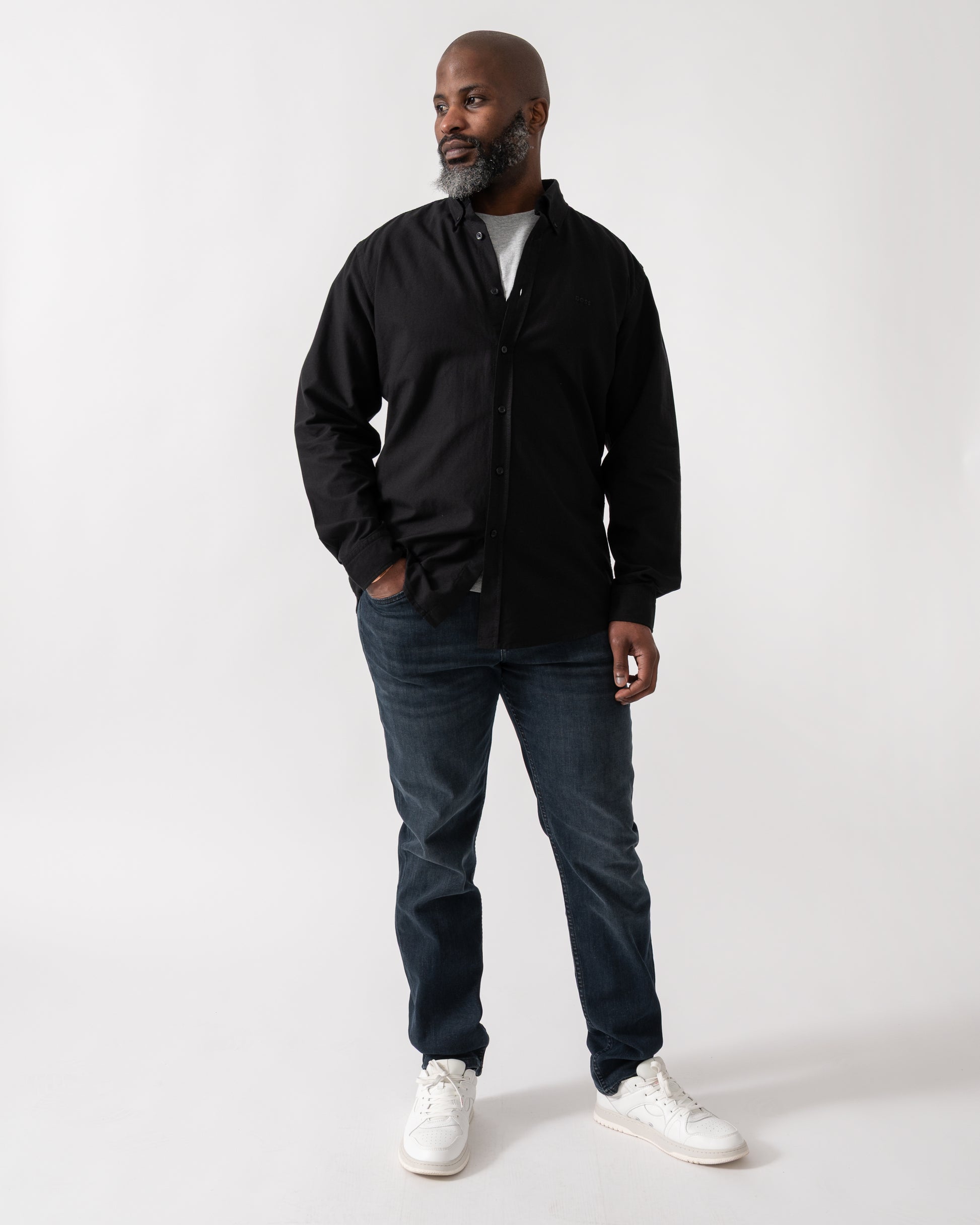 Full length shot of a Model wearing a BOSS Orange Rickert Mens Long Sleeve Shirt in Black