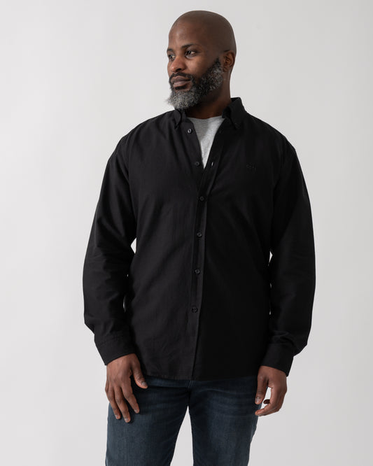 Model wearing a BOSS Orange Rickert Mens Long Sleeve Shirt in Black