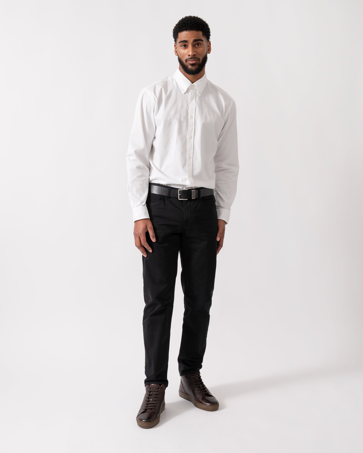 Wide shot of a model wearing a BOSS Orange Rickert Mens Shirt in Natural colourway