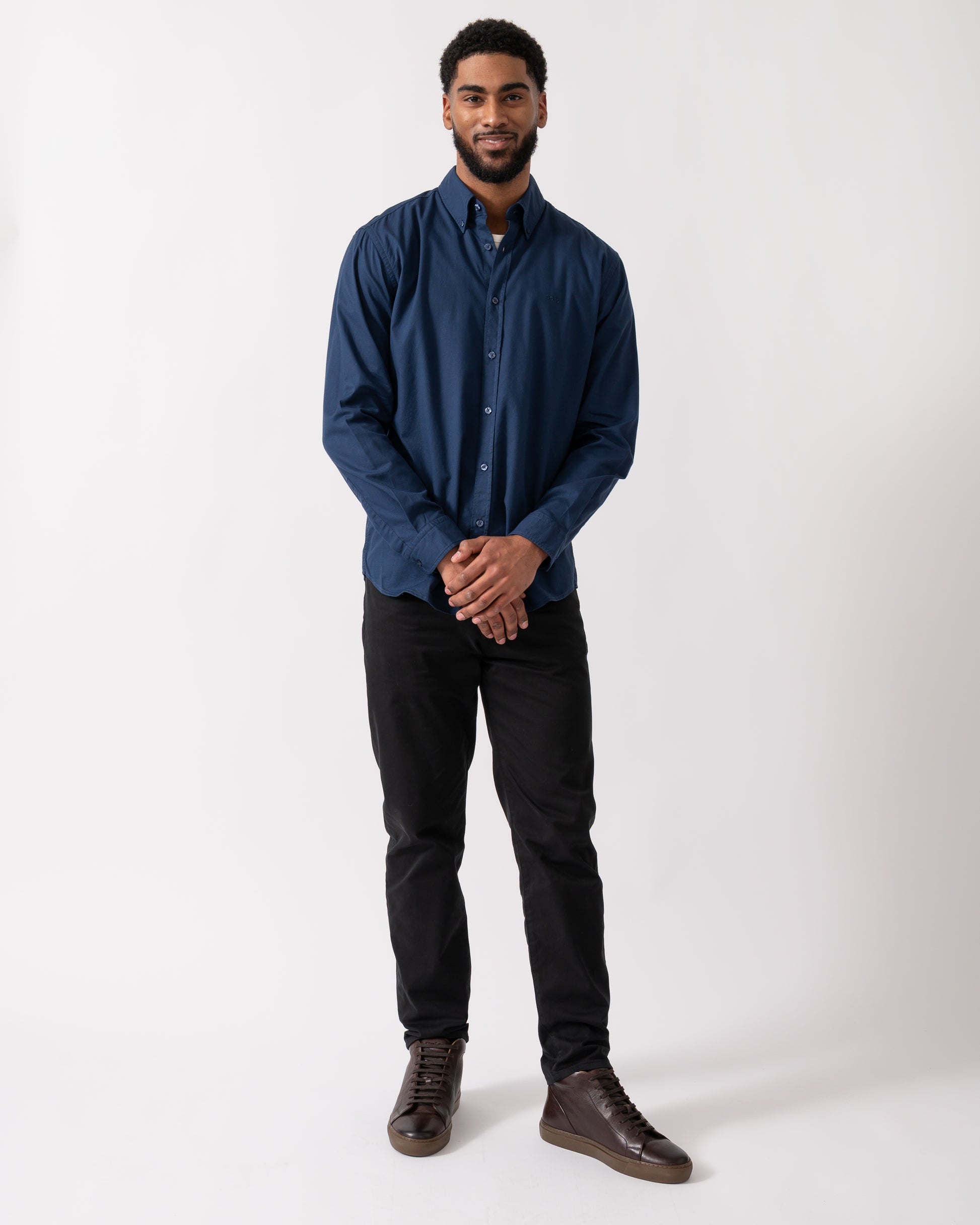 Full length shot of a model wearing a BOSS Orange Rickert_M Mens Shirt in Open Blue