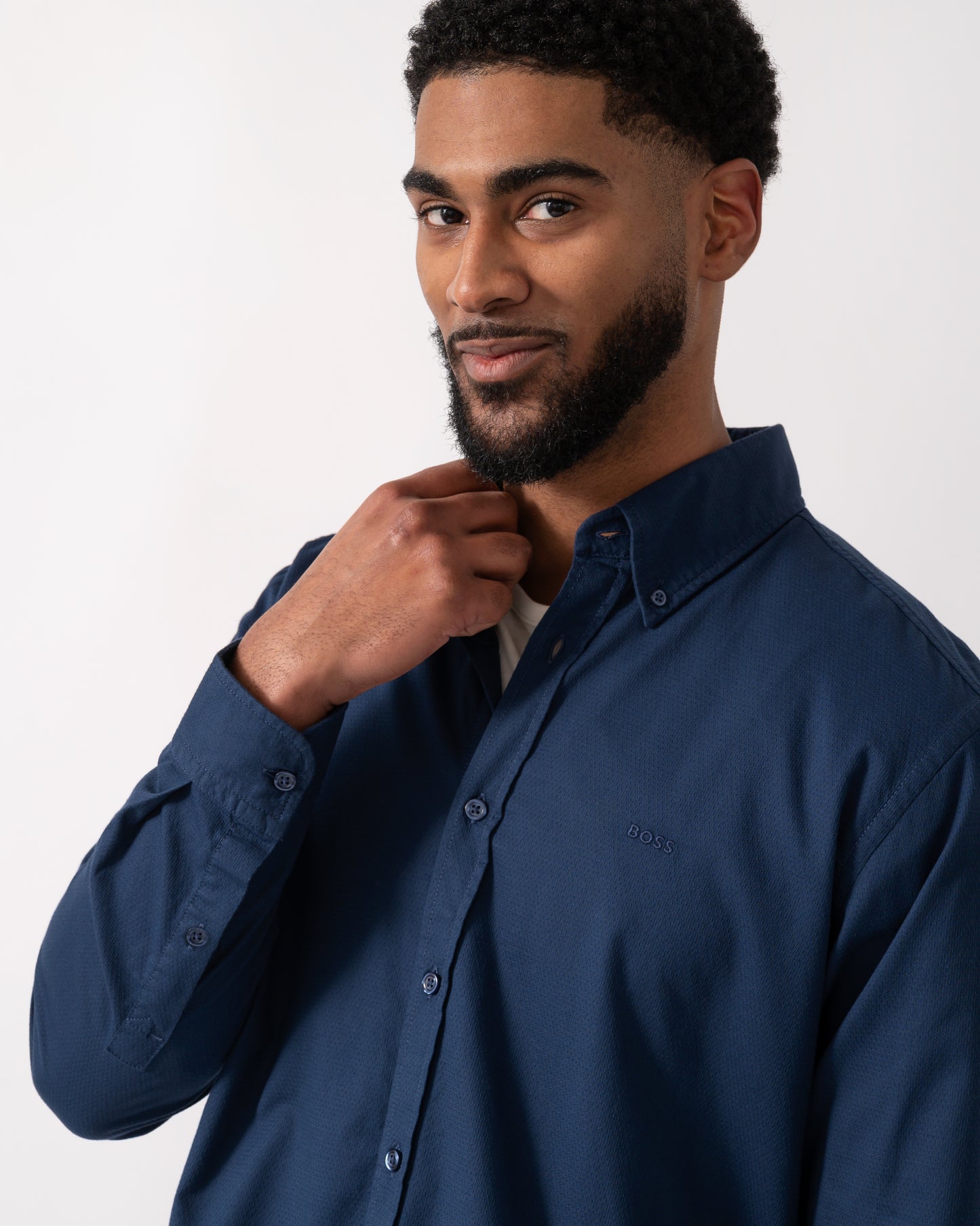 detail shot of a model wearing a BOSS Orange Rickert_M Mens Shirt in Open Blue