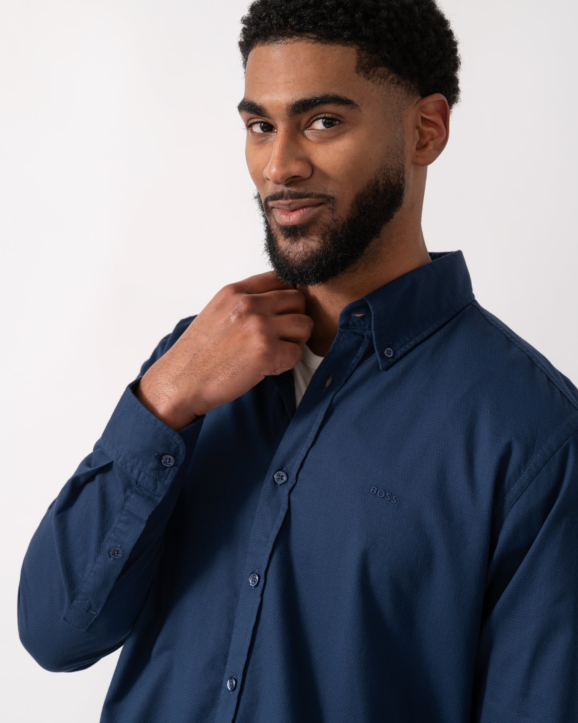 detail shot of a model wearing a BOSS Orange Rickert_M Mens Shirt in Open Blue