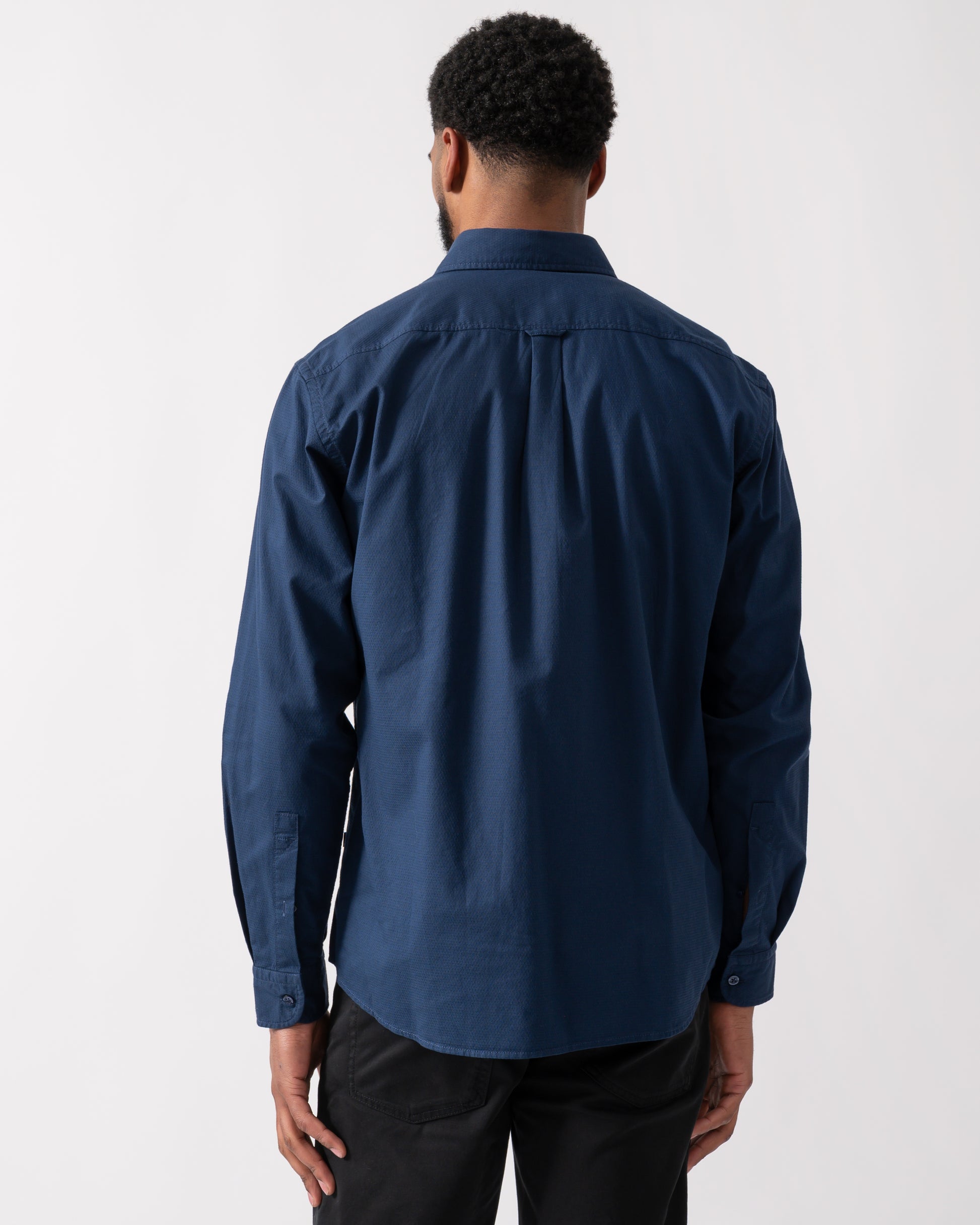 back shot of a model wearing a BOSS Orange Rickert_M Mens Shirt in Open Blue