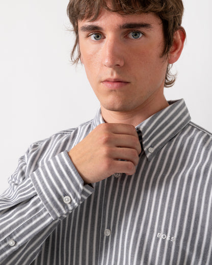 close up of model wearing a BOSS Orange Ricoplus Mens Long Sleeve Oxford Shirt in Dark Blue 404