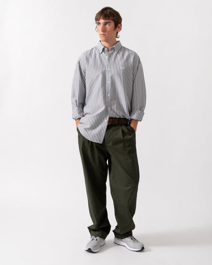 full length of model wearing a BOSS Orange Ricoplus Mens Long Sleeve Oxford Shirt in Dark Blue 404